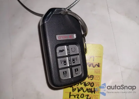 2024 Honda Odyssey Touring z USA, uszkodzony, nr VIN 5FNRL6H8XRB032500